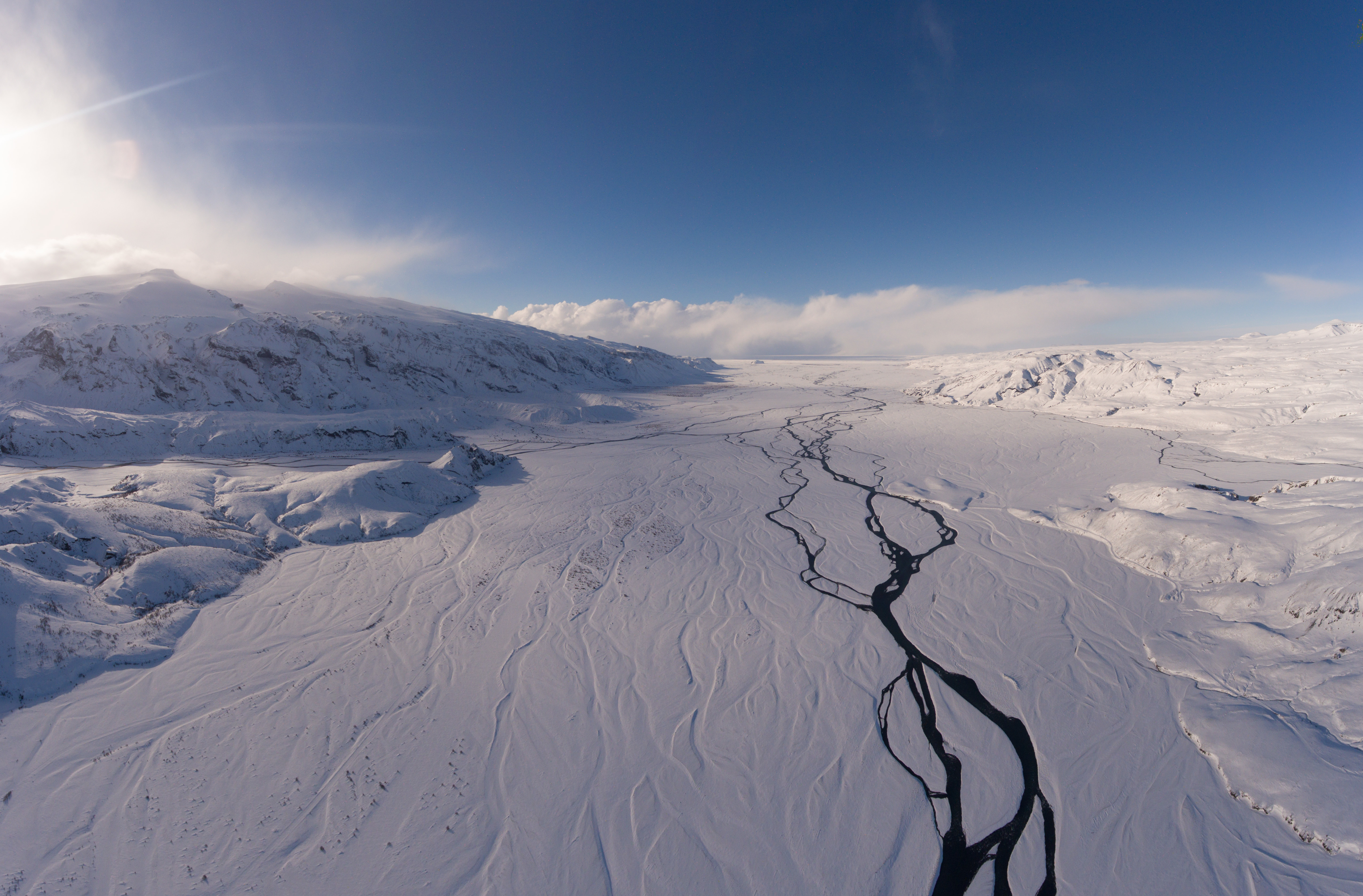 landscape-photo-snowy-mountains-cloudy-sky-daytime